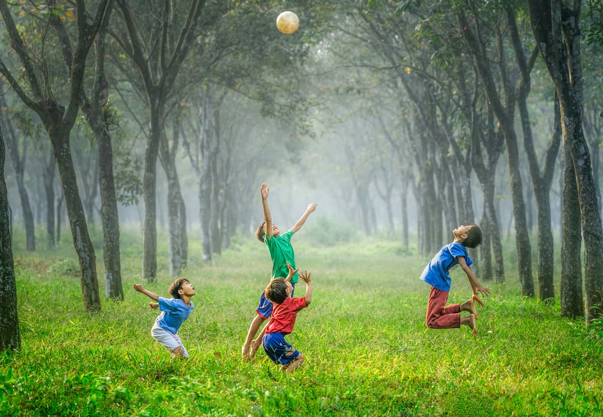 Children being active and playing sport